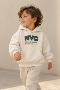 Big Apple Hoodie in White, worn by a child