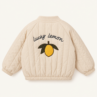 Padded Jacket in Beige, back with lemon embroidery