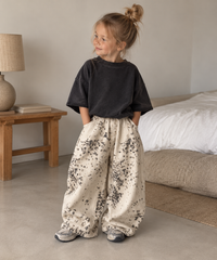 Wide Leg Leopard Jeans in Leopard, worn by a child